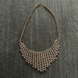 Women’s statement necklace brass look